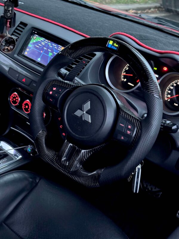 EVO X CARBON FIBRE STEERING WHEEL WITH DIGITAL METER